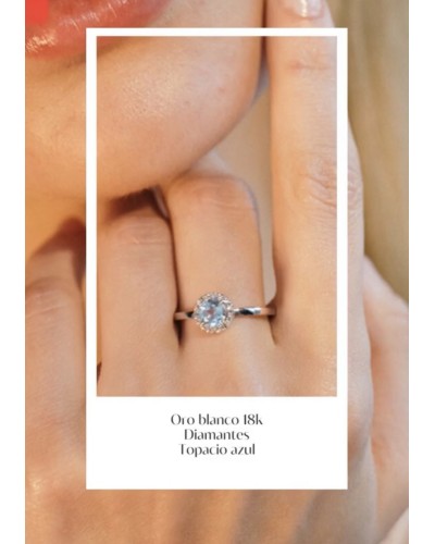 Anillo oro blanco topacio y diamantes